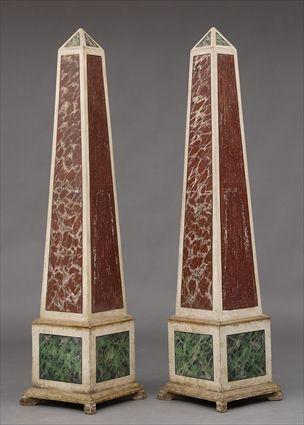 Appraisal: PAIR OF NEOCLASSICAL-STYLE MARBELIZED OBELISKS Each flared veined marble stem