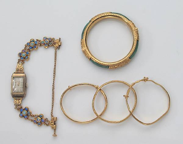 Appraisal: A collection of jewelry items including an opal and gold