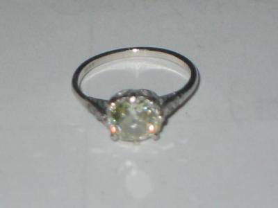 Appraisal: A SOLITAIRE DIAMOND RING the cushion cut stone approximately cts