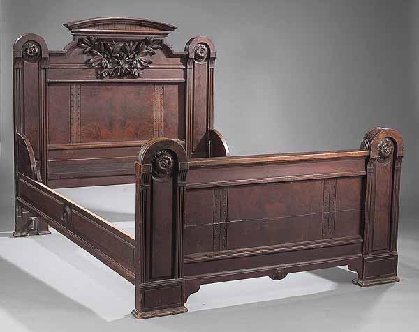 Appraisal: An American Aesthetic Carved and Burled Walnut Bedstead and Dresser