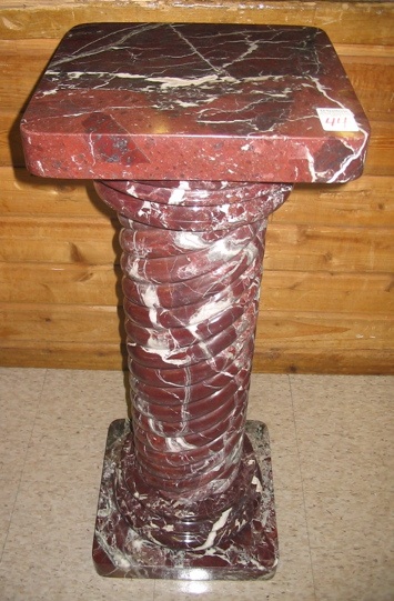 Appraisal: AN ITALIAN ROSA MARBLE PEDESTAL the square top spirally reeded