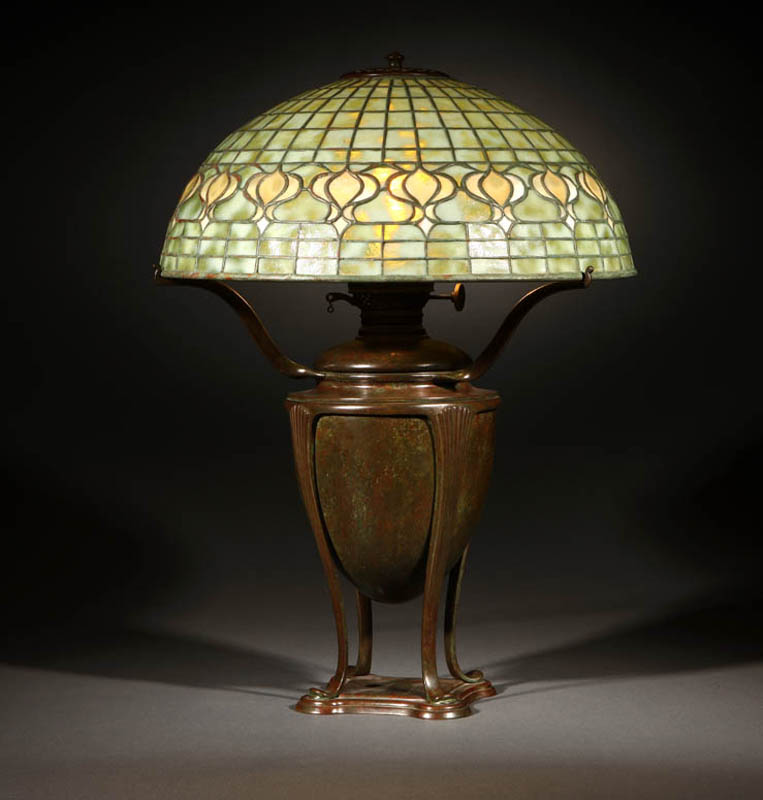 Appraisal: A Tiffany Studios bronze leaded glass oil lamp A Tiffany