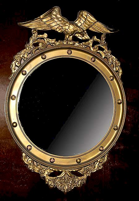 Appraisal: Early American Style Eagle Mirror A carved wooden eagle convex