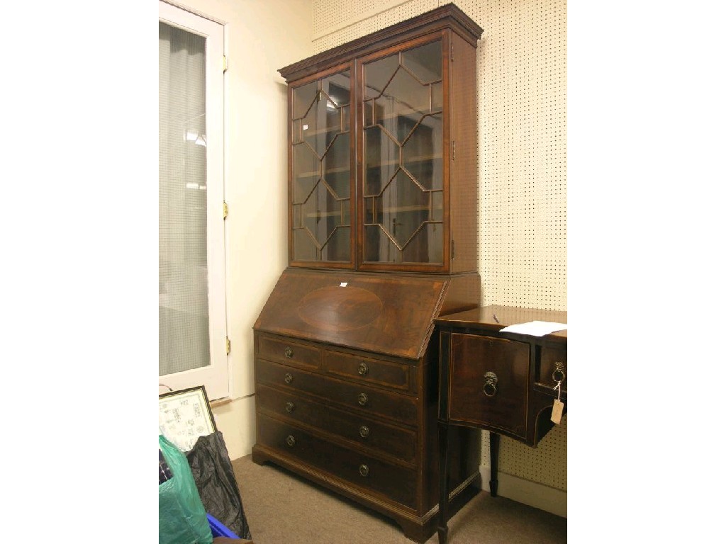 Appraisal: An early th century inlaid mahogany bureau-bookcase upper stage with