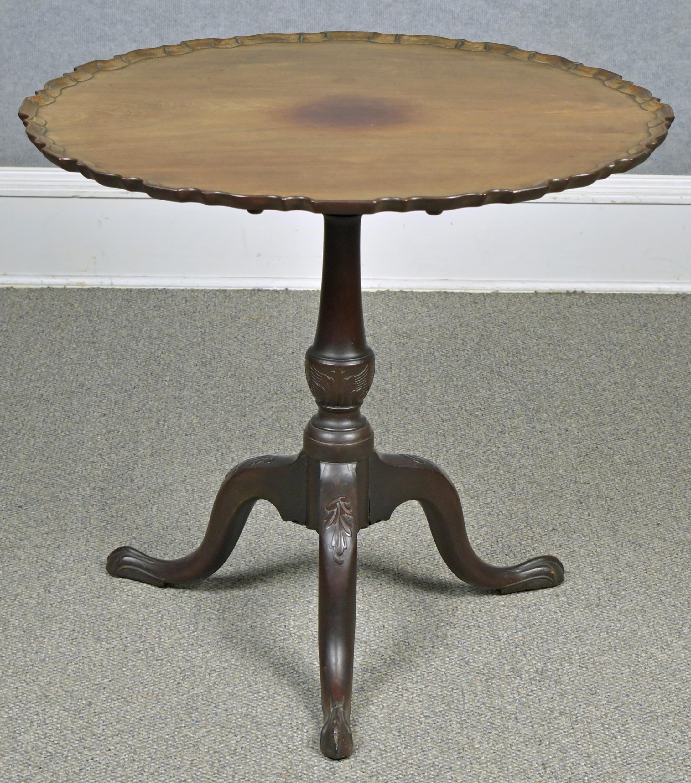 Appraisal: TH C MAHOGANY PIECRUST TEA TABLE Mahogany tea table with