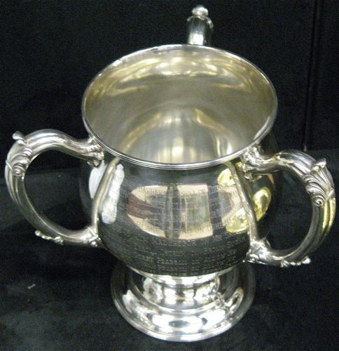 Appraisal: A STERLING SILVER PRESENTATION LOVING CUP AND A SILVER PLATED