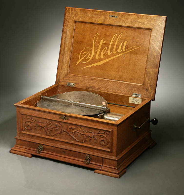 Appraisal: Stella Symphonic disk golden oak music box Stella Symphonic disk