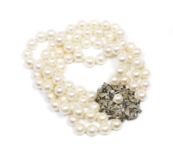 Appraisal: A PEARL BRACELET circa White gold clasp Elegant four-row bracelet