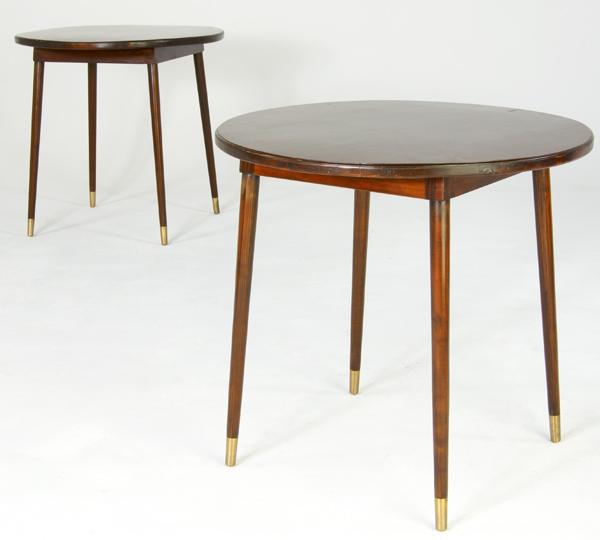 Appraisal: MODERN Pair of lacquered wood occasional tables with brass-capped feet