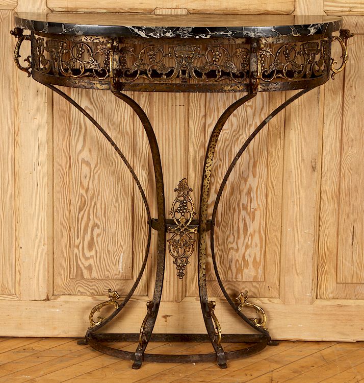 Appraisal: BRASS IRON CONSOLE TABLE MANNER OF OSCAR BACH A brass