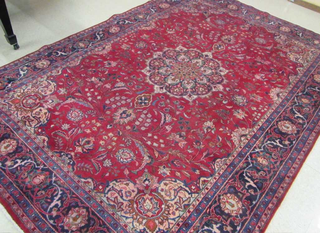 Appraisal: SEMI-ANTIQUE PERSIAN MASHAD CARPET Razavi Khorasan Province southeast Iran floral