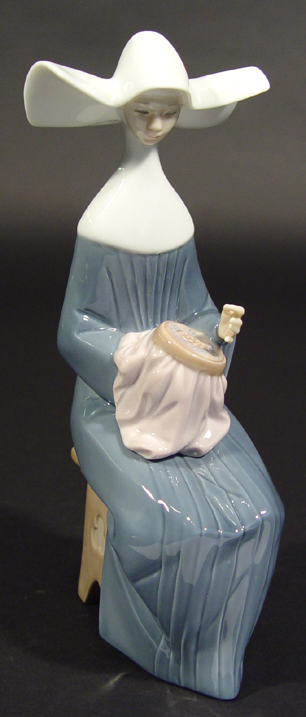 Appraisal: Lladro porcelain 'Nun Stitching A Tapestry' with hand painted decoration