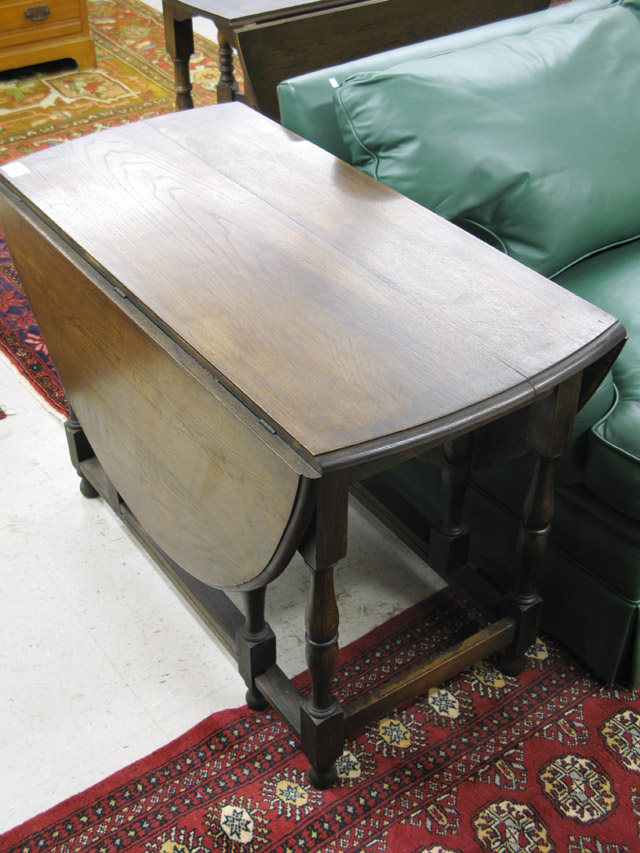 Appraisal: AN OAK DROP-LEAF GATE-LEG DINING TABLE Wales early th century