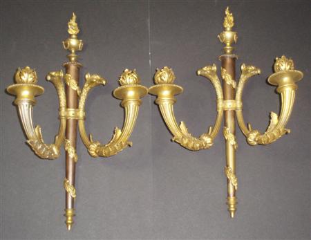 Appraisal: A pair of French Empire gilt and polished bronze wall