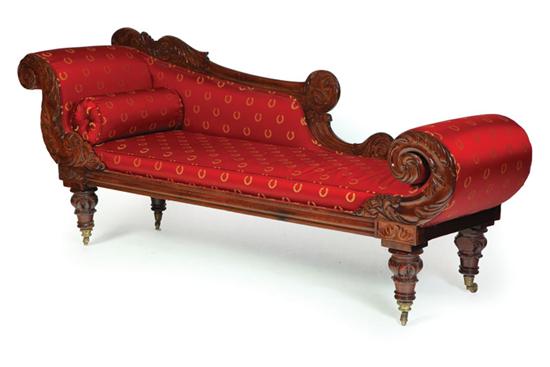 Appraisal: CLASSICAL RECAMIER American ca mahogany Scrolled head and footrests acanthus