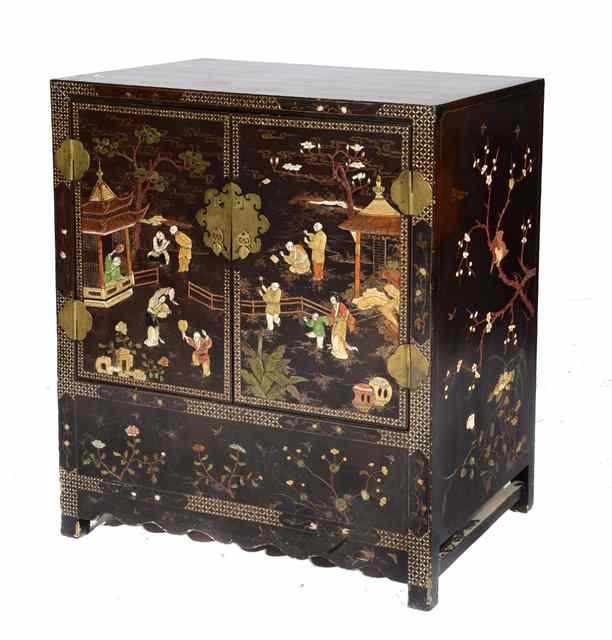 Appraisal: A CHINESE LACQUERED CABINET the interior fitted a shelf enclosed