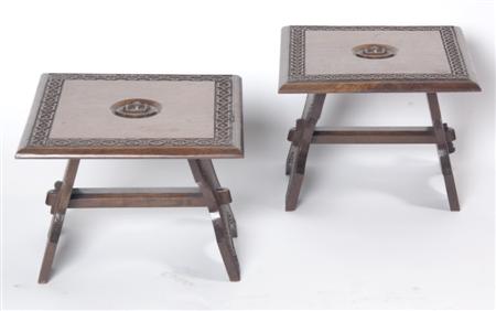 Appraisal: A pair of Victorian carved walnut stools the square top