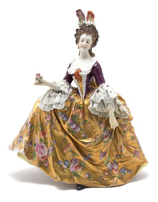 Appraisal: Continental Porcelain Figure of a Woman depicted in a flowing