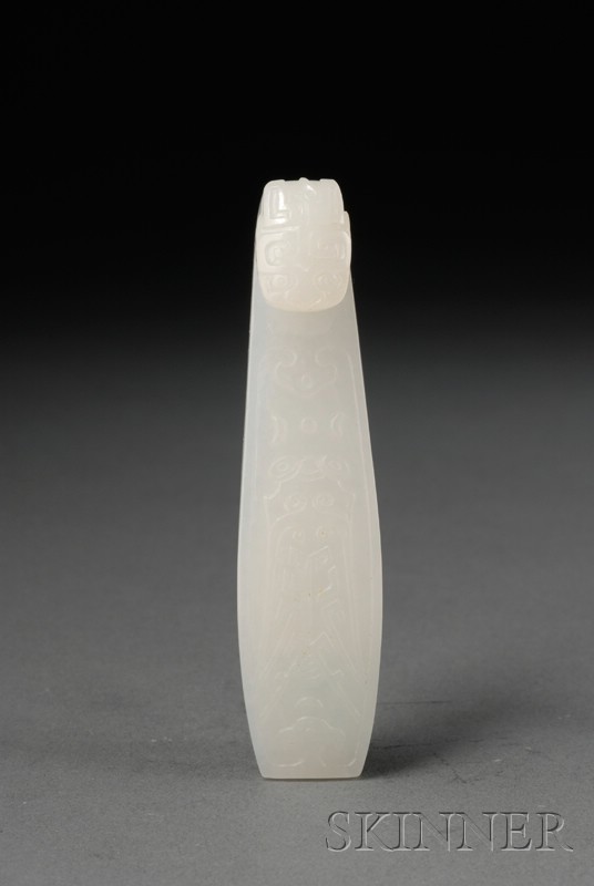 Appraisal: Pure White Jade Garment Hook th century dragon finial surface