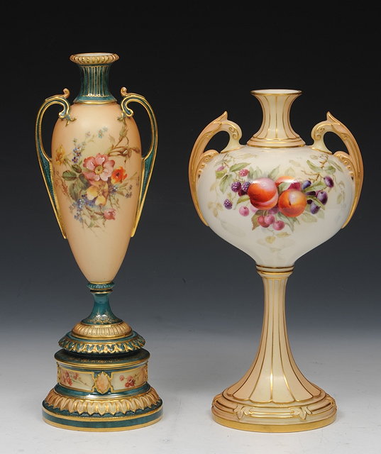 Appraisal: A ROYAL WORCESTER TWO HANDLED VASE pattern painted with a