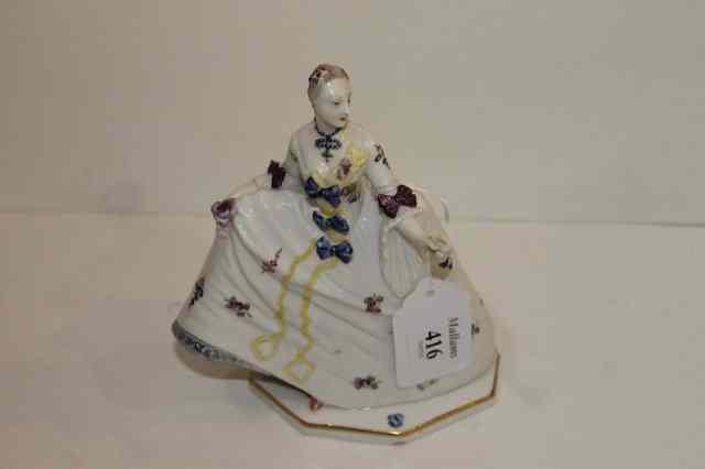 Appraisal: A CONTINENTAL PORCELAIN MODEL OF A LADY possibly a Vienna