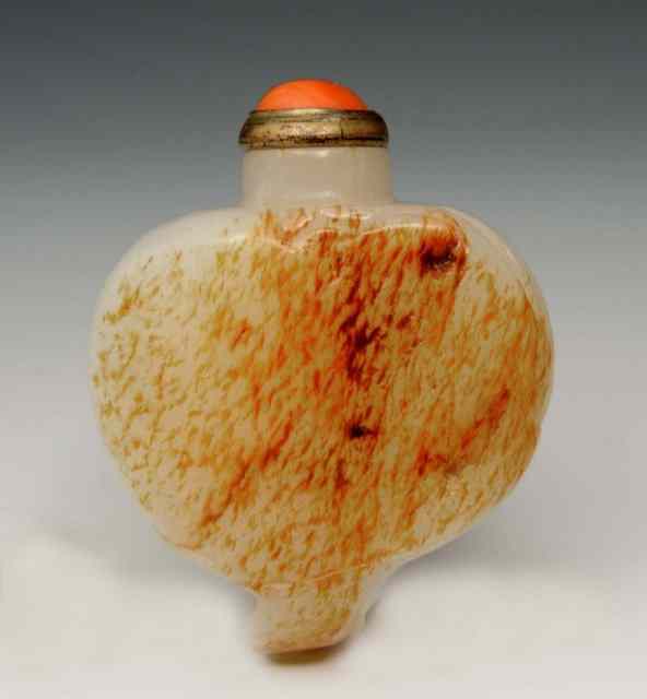 Appraisal: A CHINESE NATURAL BROWN SKIN AND MUTTON FAT JADE PEBBLE