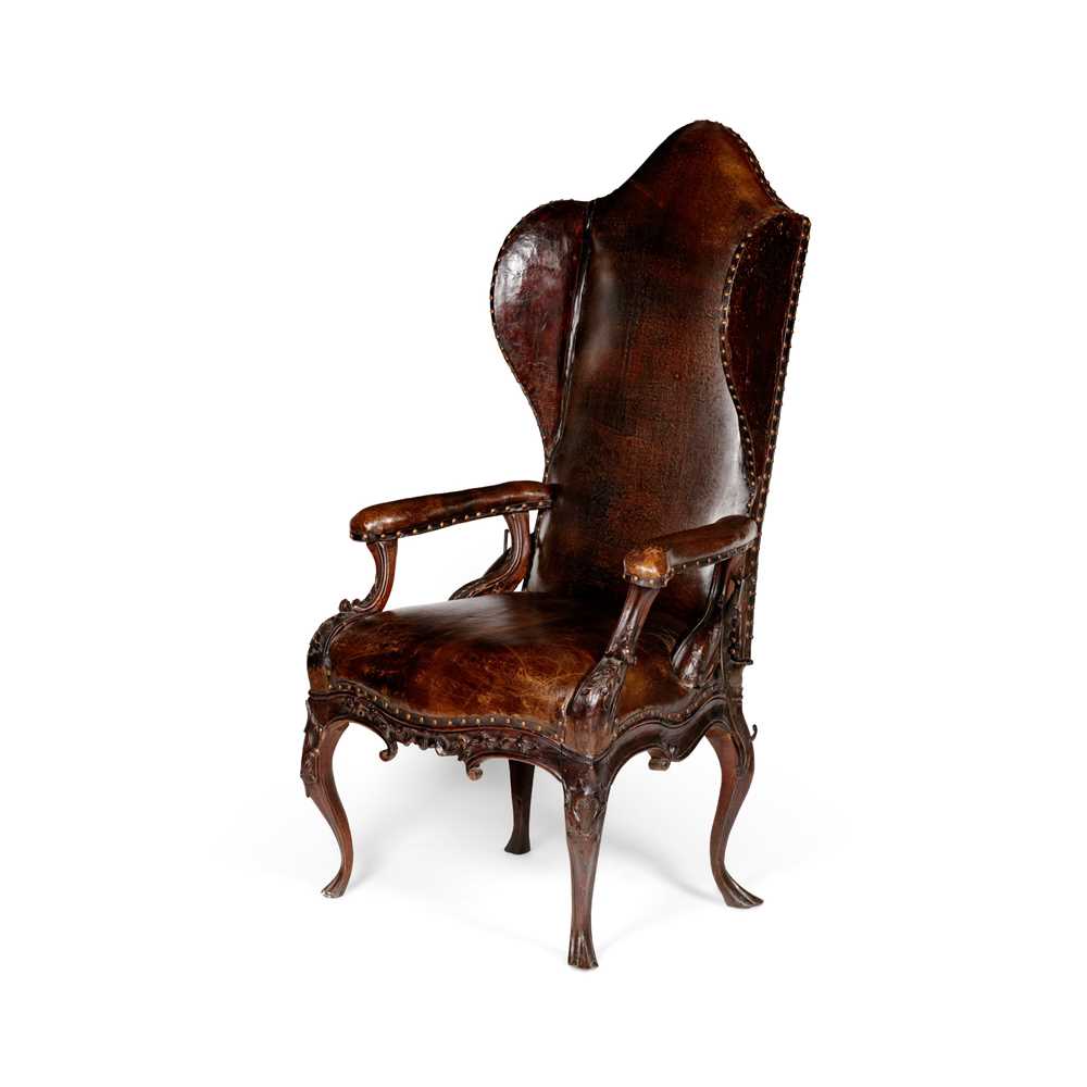 Appraisal: NORTH ITALIAN WALNUT AND BROWN LEATHER WING ARMCHAIR MID TH