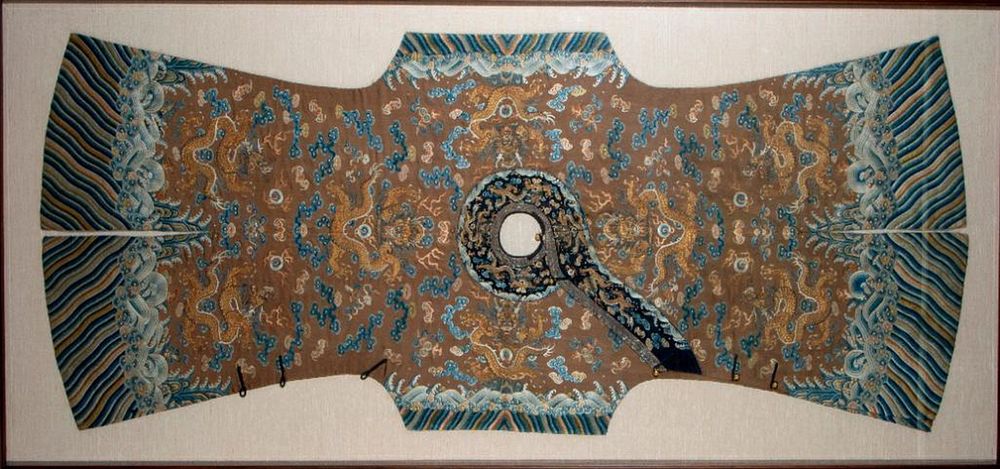 Appraisal: A th century 'nine-dragon' child's robe A th century brown-ground