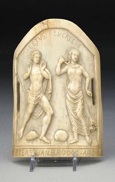 Appraisal: A carved ivory plaque th century The arched panel centered