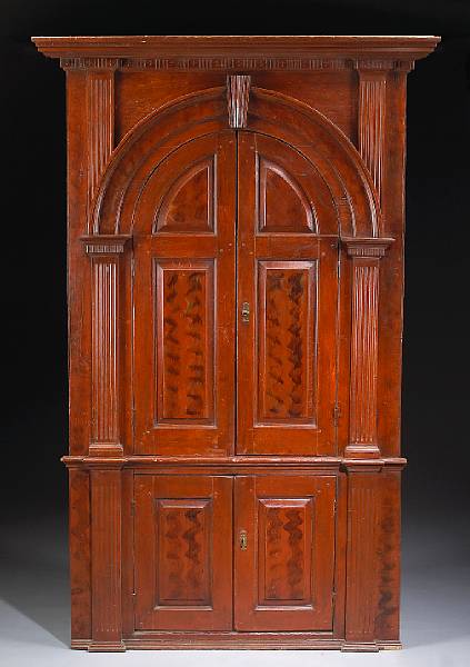 Appraisal: A Chippendale grain painted architectural corner cupboard late th century