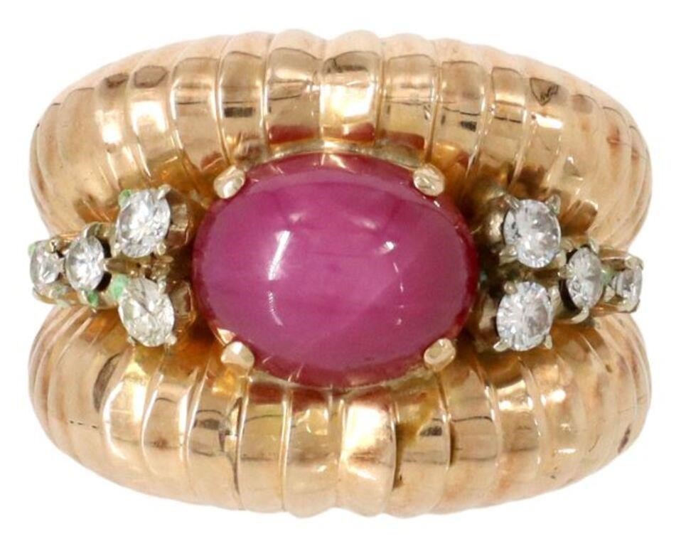 Appraisal: Estate kt yellow gold tested ring lab-created star ruby cabochon