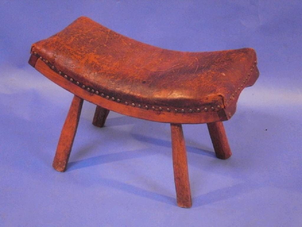 Appraisal: An elm country stool with over upholstered and studded leather