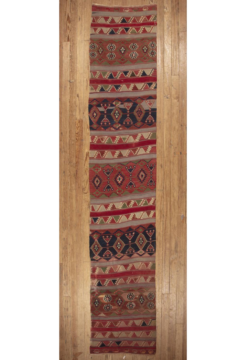 Appraisal: Turkish Kilim Runner alternating bands of medallions ft in x