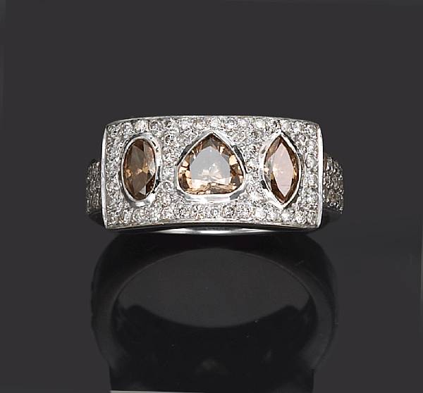 Appraisal: A colored diamond and diamond ring estimated total diamond weight