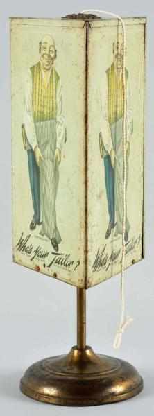 Appraisal: Tin Who's Your Tailor String Holder Description Early s Nice