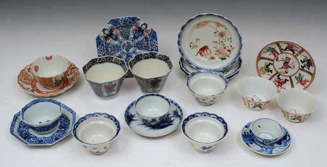 Appraisal: A COLLECTION OF CHINESE TEA BOWLS and saucers including famille