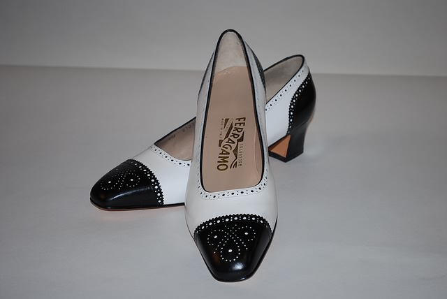 Appraisal: Salvatore Ferragamo black white spectator pumps Size B Price Original