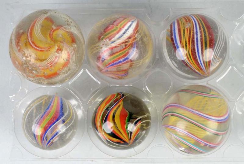 Appraisal: Lot of Handmade Swirl Marbles Description Largest marbles have some