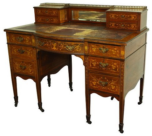 Appraisal: An Edwardian inlaid rosewood writing table with a pierced gallery