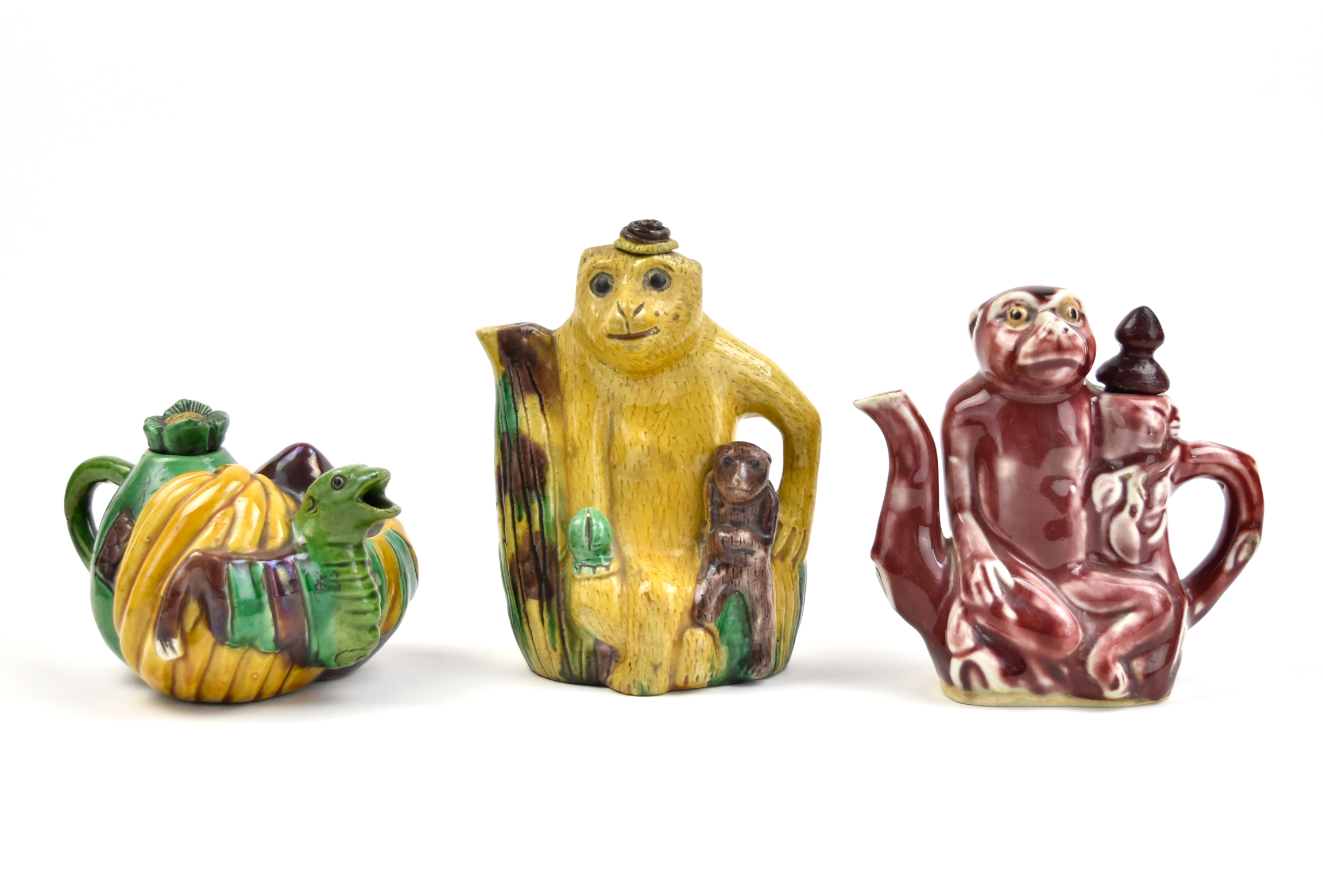 Appraisal: group of Chinese teapots with stoppers in the form of