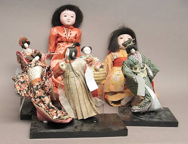 Appraisal: Thirteen Japanese dolls Including seven isho-ningyo fashion dolls of a