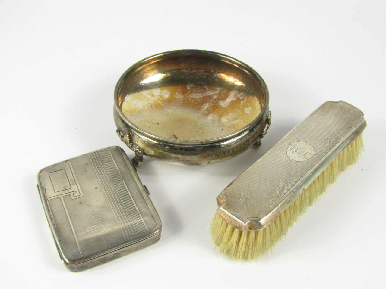 Appraisal: A George V silver pocket cigarette case with engine turned