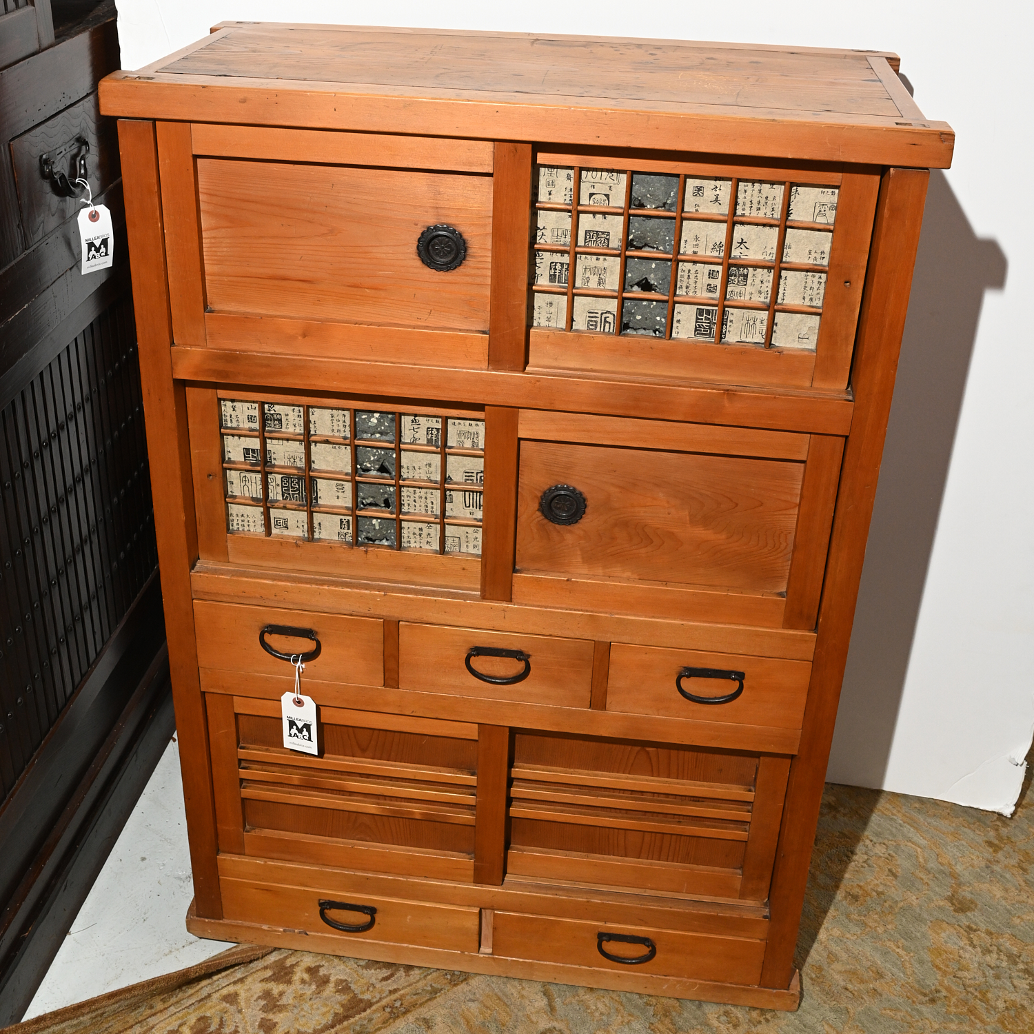 Appraisal: JAPANESE TANSU CABINET th c comprising sliding door cabinets and