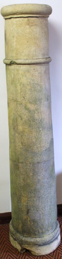 Appraisal: An early thC stone baked chimney pot the cylindrical body