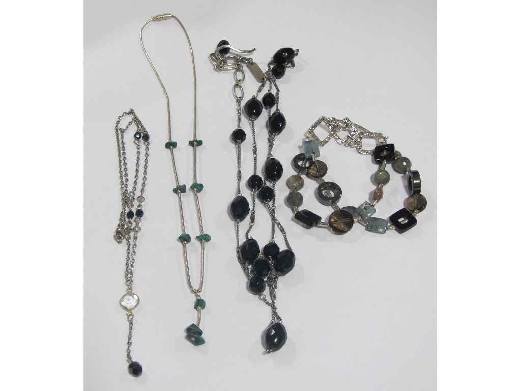 Appraisal: Lot comprising three contemporary stone spacer necklaces and a silver