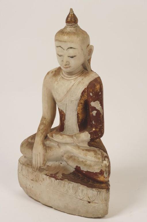 Appraisal: A FAR EASTERN ALABASTER BUDDHA with traces of polychrome and