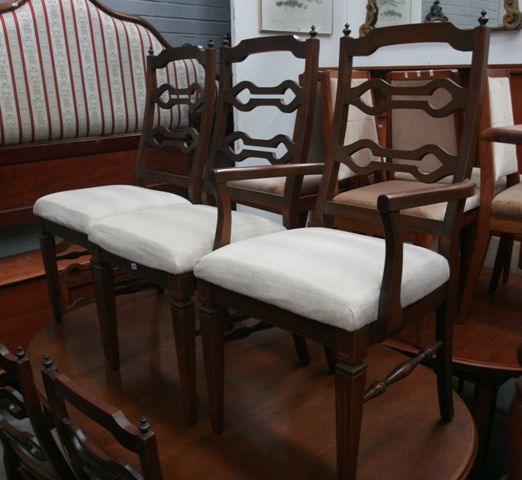 Appraisal: A set of six oak dining chairs including two carvers