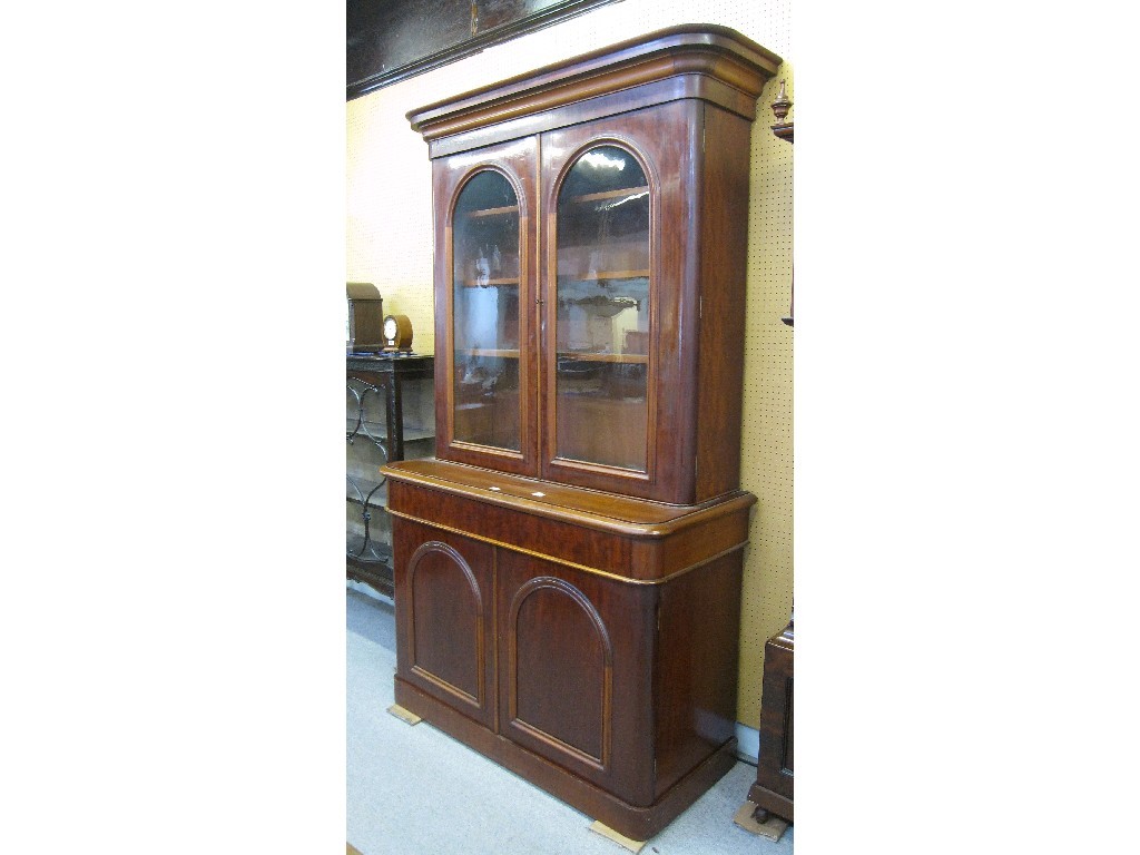 Appraisal: Victorian mahogany two door bookcase on cabinet