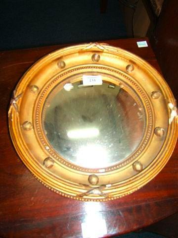 Appraisal: A Victorian gilt framed circular convex mirror diameter