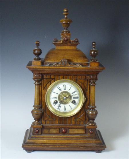 Appraisal: A late th century German oak bracket clock with white